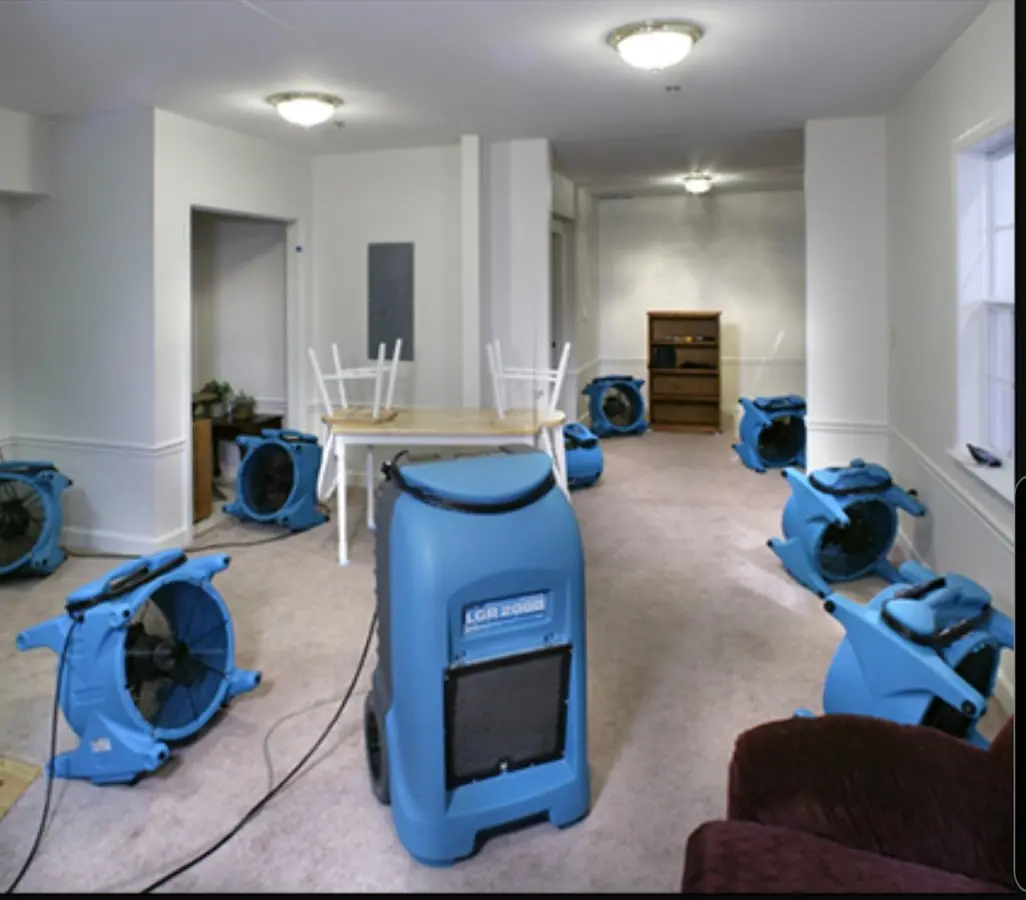 Air movers and dehumidifier setup for Water Extraction & Removal in Lansing